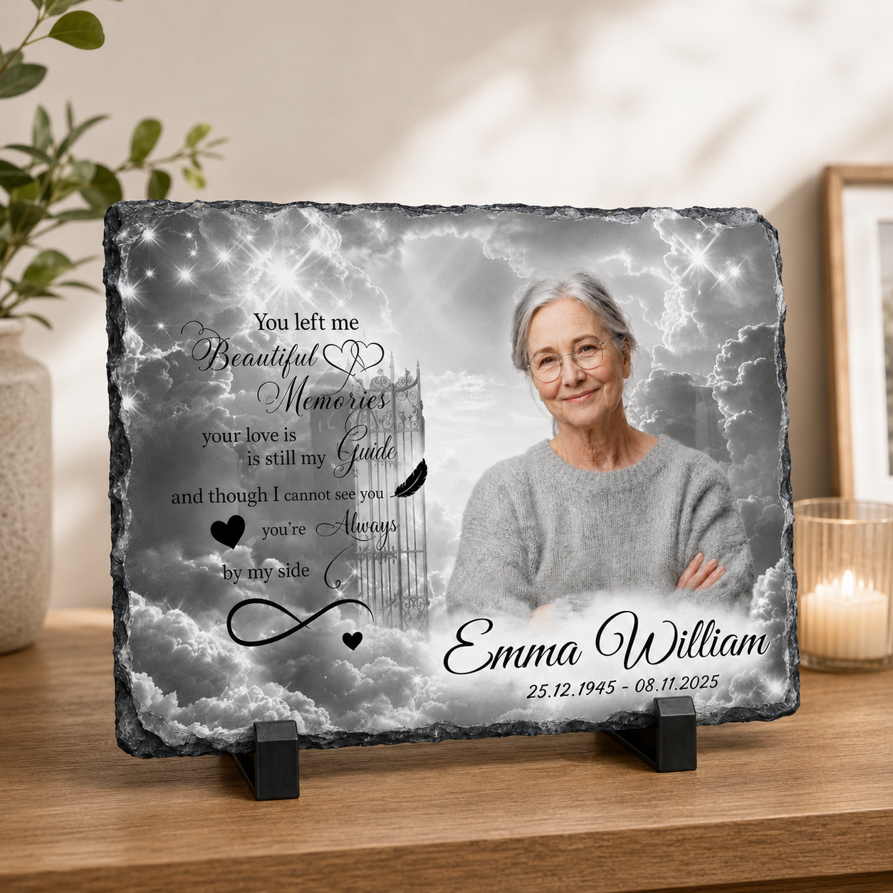 Personalized memorial slate plaque on a wooden stand, featuring a printed portrait of an elderly woman, cloudy background, and memorial text reading 'You left me Beautiful Memories.